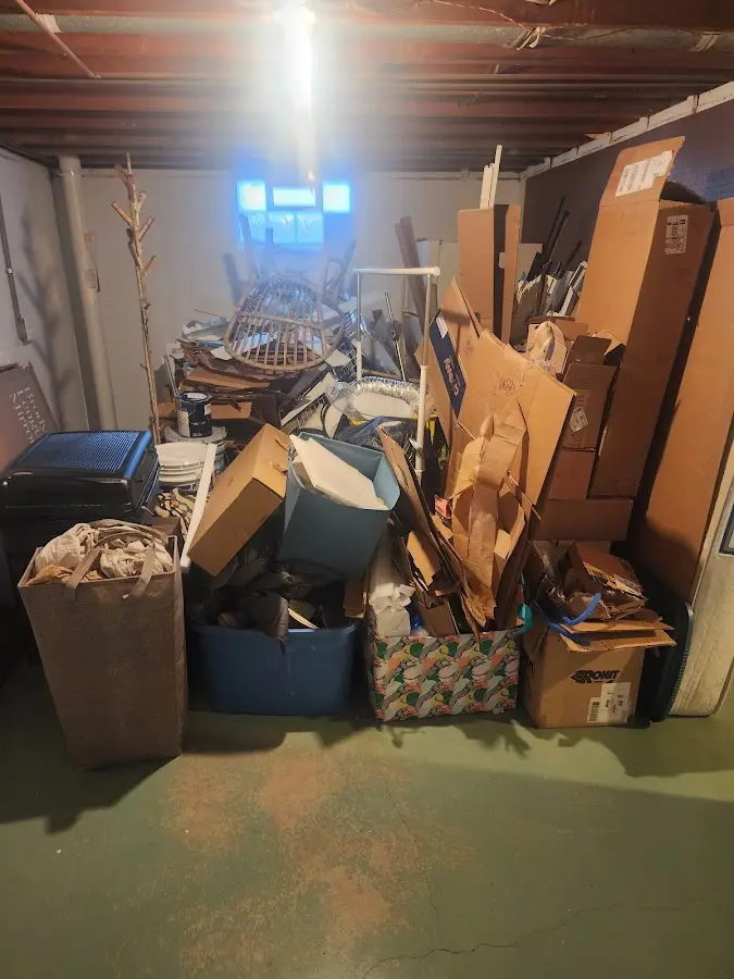 Roll-off dumpster container at job site for Construction Dumpster Rental in Benson